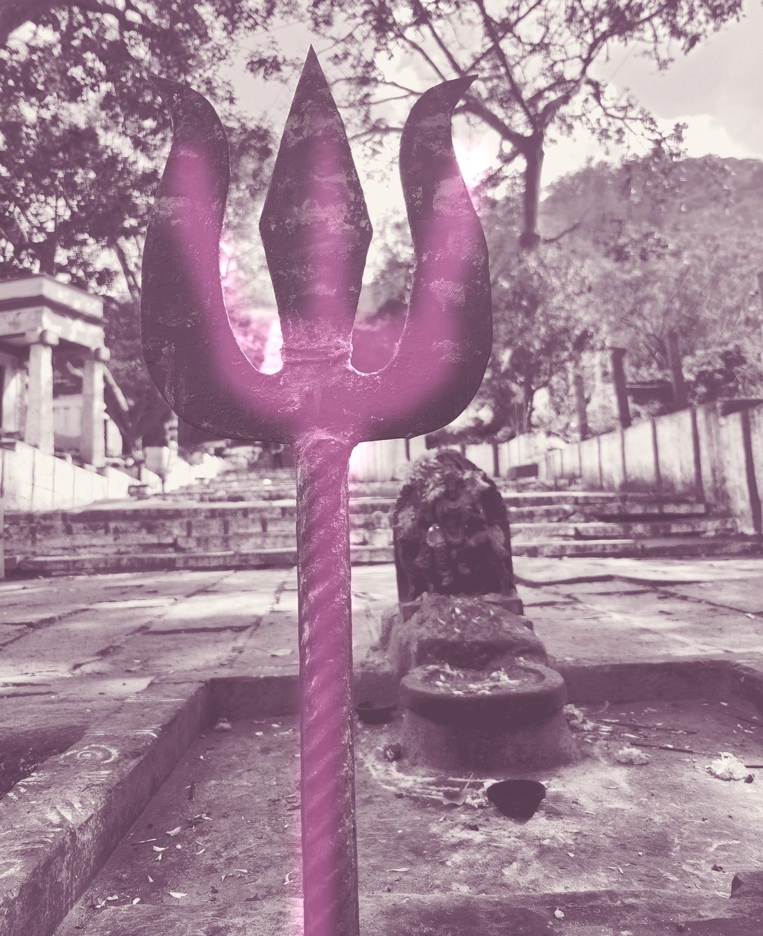 A triśūla planted upright before a kumkum-smeared Śiva liṅga on a stone shrine platform, toned to plum and cream